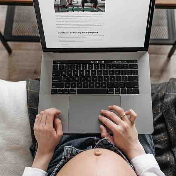 pregnant laptop on belly